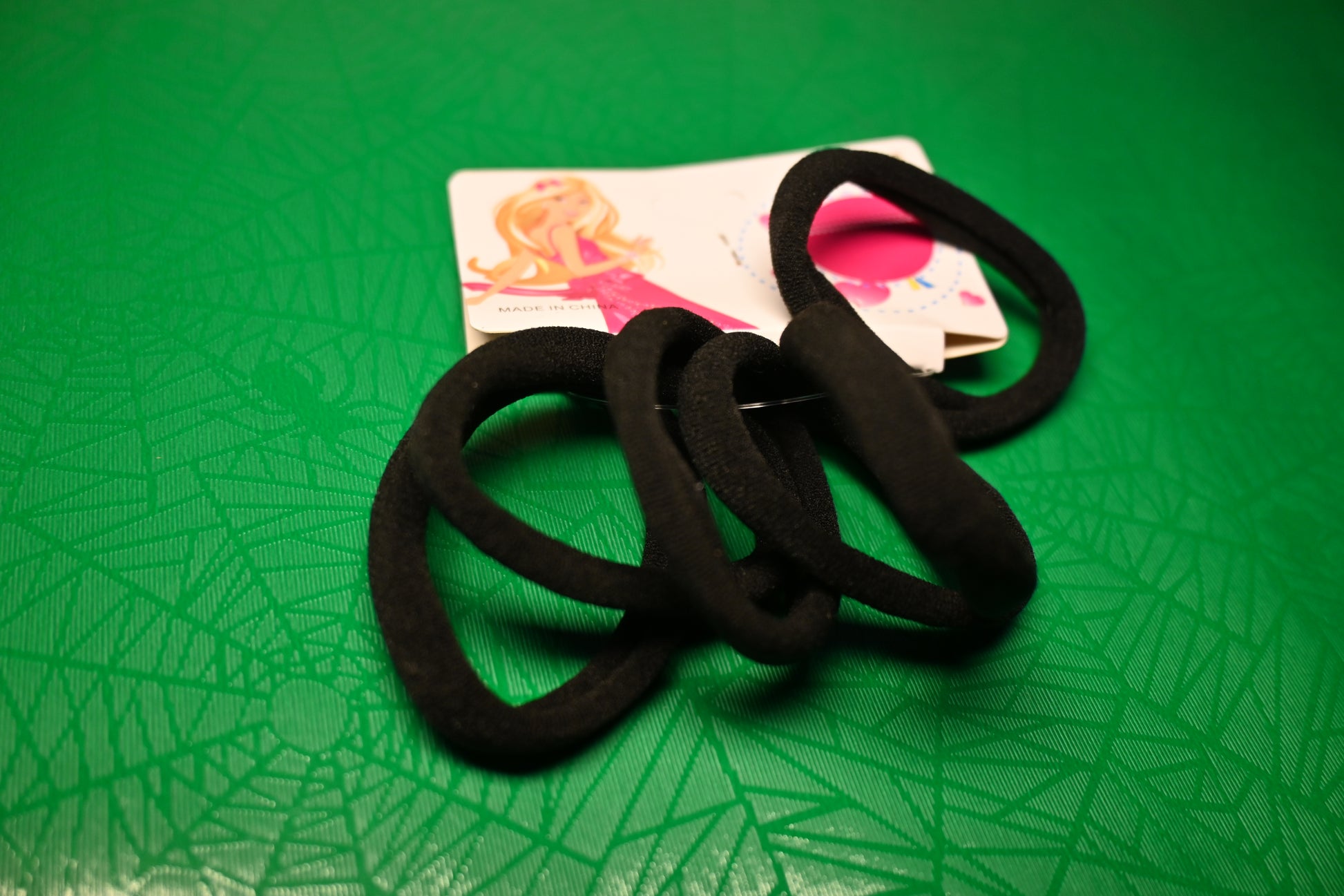 Moña en liga elástica